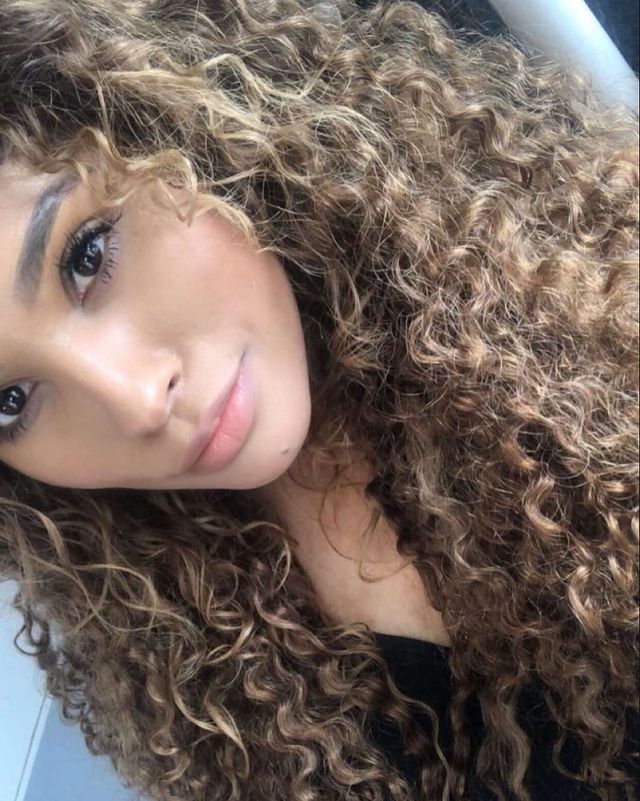 social post by curlyheavenhair