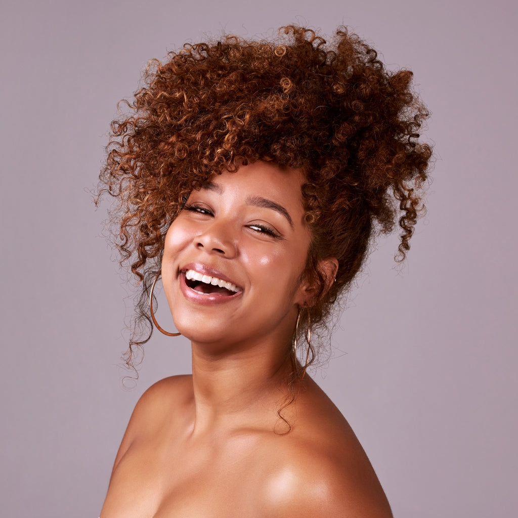Curly Heaven’s Sambi Strawberry Blonde Curly Clip-In Extensions for 3B curls